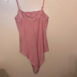 Pink bodysuit